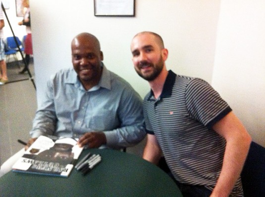 R. Gregory Christie and Peter Brown signing their books